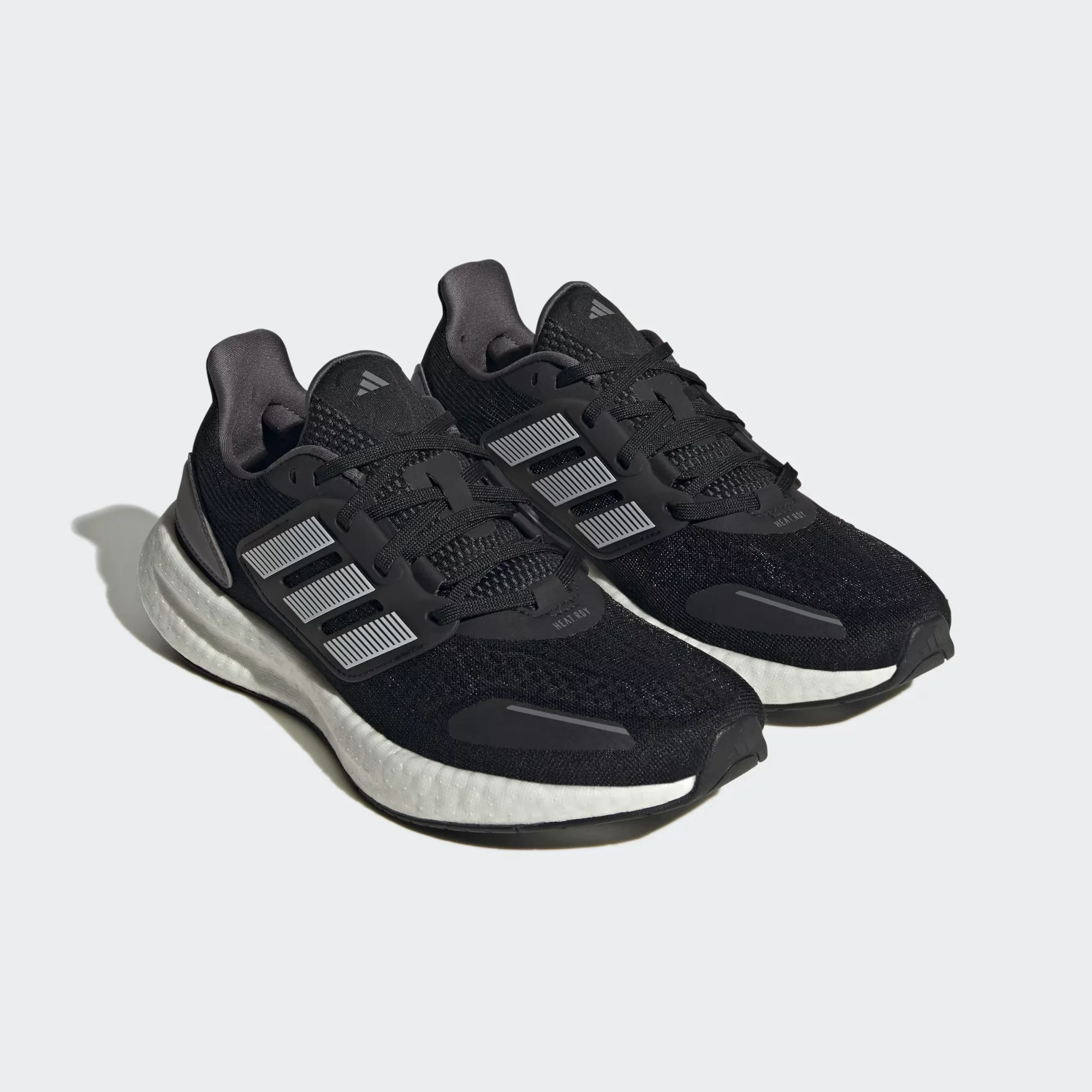 adidas pureboost 22 heat.rdy black white side view, adidas pureboost 22 mesh upper breathable design, adidas boost sole cushioning detail, adidas pureboost 22 outsole grip bottom, adidas pureboost 22 on feet running look men, adidas pureboost 22 heel cushioning close up, adidas pureboost 22 summer running shoes,