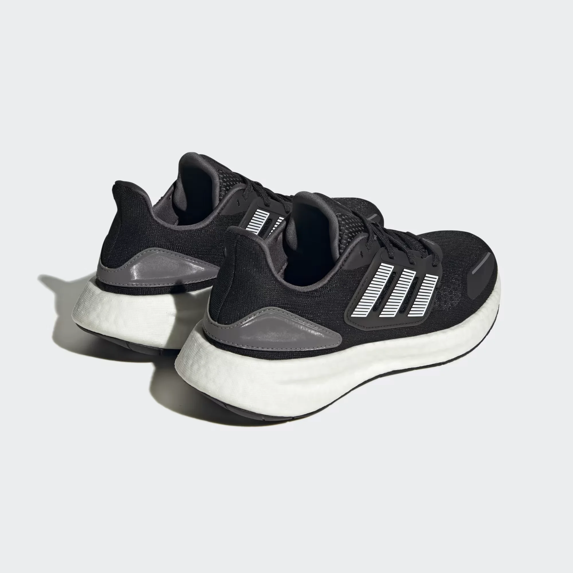 adidas pureboost 22 heat.rdy black white side view, adidas pureboost 22 mesh upper breathable design, adidas boost sole cushioning detail, adidas pureboost 22 outsole grip bottom, adidas pureboost 22 on feet running look men, adidas pureboost 22 heel cushioning close up, adidas pureboost 22 summer running shoes,