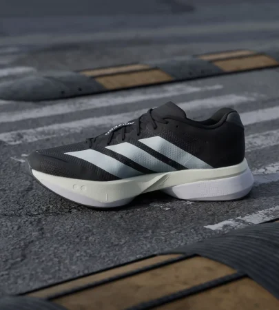 adidas adizero boston 13 black white side view, adidas boston 13 mesh upper close up, adidas energy rods midsole detail, adidas boston 13 outsole continental rubber grip, adidas boston 13 on feet running look, adidas boston 13 heel cushioning view, adidas boston 13 full shoe profile,