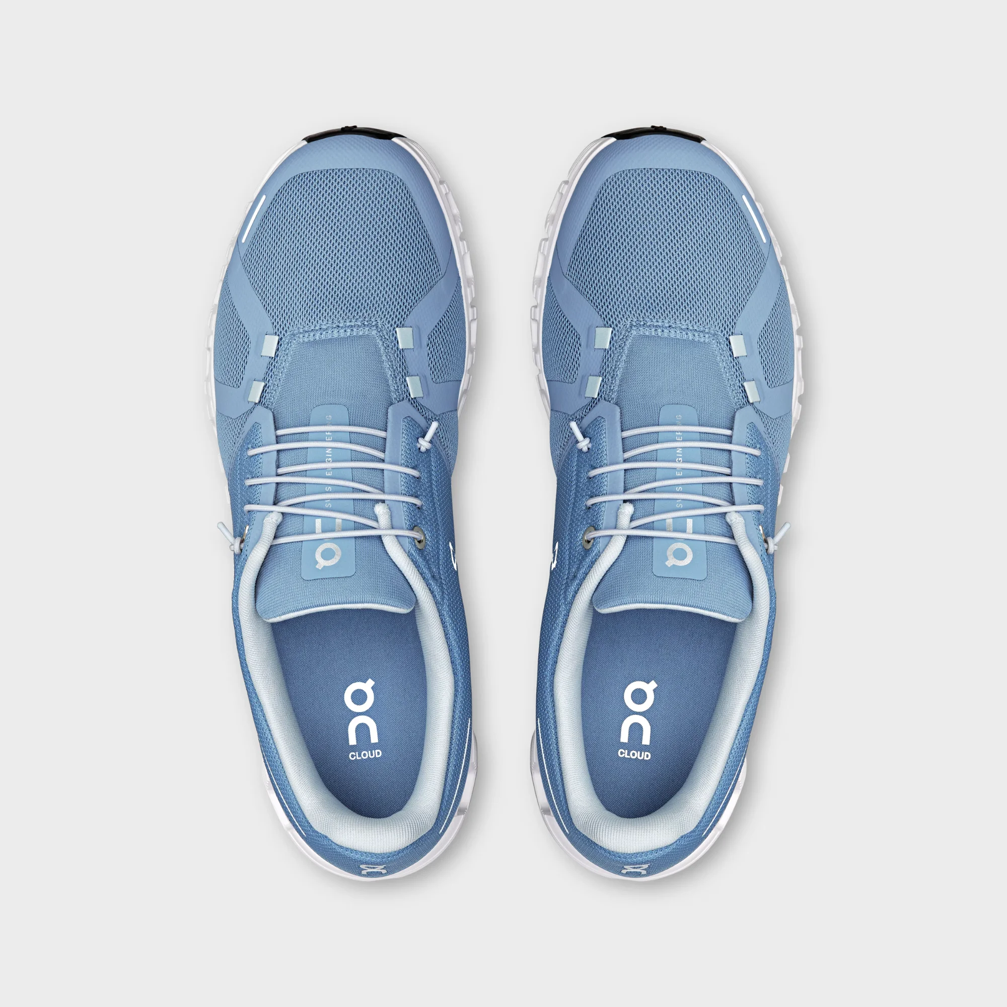 on cloud 6 chambray white side view, on running cloud 6 mens sneaker, on cloud 6 cloudtec sole closeup, on cloud 6 white blue profile, on running shoe outsole detail, on cloud 6 on feet look, lightweight swiss running shoe,