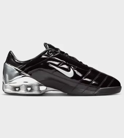 nike total 90 shox magia side view, nike total 90 black metallic silver, nike shox heel columns, nike total 90 quilted upper, nike total 90 mens sneaker, nike total 90 unisex sneaker, nike football lifestyle sneaker, nike total 90 on feet, nike shox outsole, nike total 90 profile, Nike Total 90 Shox Magia SP Black Metallic Silver men's sneaker, Nike Total 90 Shox Magia IM9326-001 side profile, Nike Total 90 quilted upper close-up, Nike Shox heel cushioning detail, Nike Total 90 lifestyle sneaker for men, Original Nike Total 90 Shox Magia Pakistan, Black Metallic Silver Nike T90 Shox on-foot view, Nike Total 90 retro football-inspired sneaker, Nike Total 90 rubber outsole detail, Nike T90 Shox Maha Amsterdam collaboration,