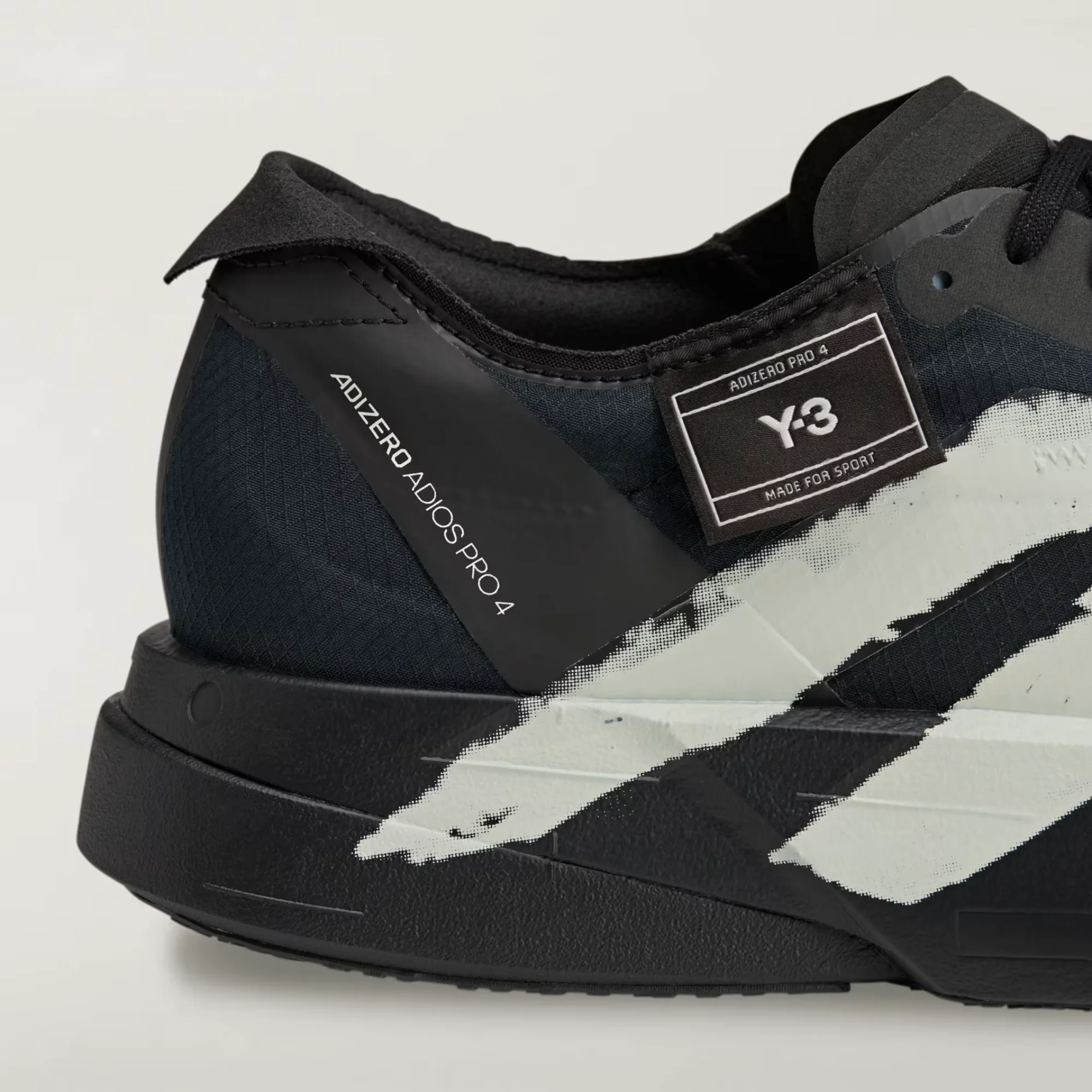 adidas Y-3 Adizero Adios Pro 4 JR6655 Black Off White, adidas Y-3 Adios Pro 4 Side View, adidas Y-3 Adios Pro 4 Front View, adidas Y-3 Adios Pro 4 Rear View, adidas Y-3 Adios Pro 4 LIGHTSTRIKE PRO Midsole, adidas Y-3 Adios Pro 4 ENERGYRODS 2.0, adidas Y-3 Adios Pro 4 Continental Rubber Outsole, adidas Y-3 Marathon Racing Shoes, Original adidas Y-3 JR6655 Pakistan,