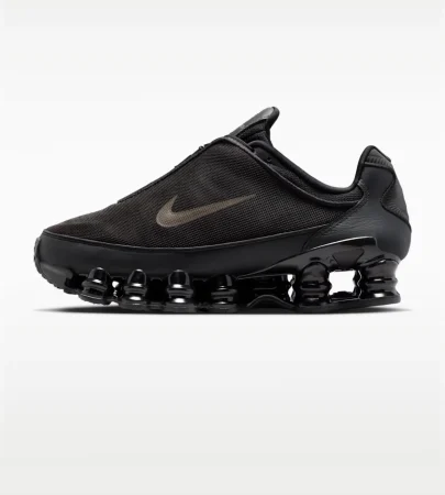 Nike Shox TL Black Cave Stone HM9612-010 Nike Shox TL Women's Shoes Black Cave Stone Nike Shox TL Black Side View Nike Shox TL Front View Nike Shox TL Rear View Nike Shox TL Full Length Shox Cushioning Nike Shox TL TPU Cage Upper Nike Shox TL Rubber Outsole Nike Shox TL Lifestyle Sneakers Original Nike Shox TL Pakistan