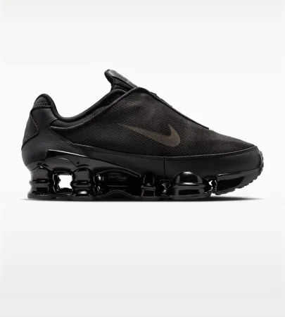 Nike Shox TL Black Cave Stone HM9612-010 Nike Shox TL Women's Shoes Black Cave Stone Nike Shox TL Black Side View Nike Shox TL Front View Nike Shox TL Rear View Nike Shox TL Full Length Shox Cushioning Nike Shox TL TPU Cage Upper Nike Shox TL Rubber Outsole Nike Shox TL Lifestyle Sneakers Original Nike Shox TL Pakistan
