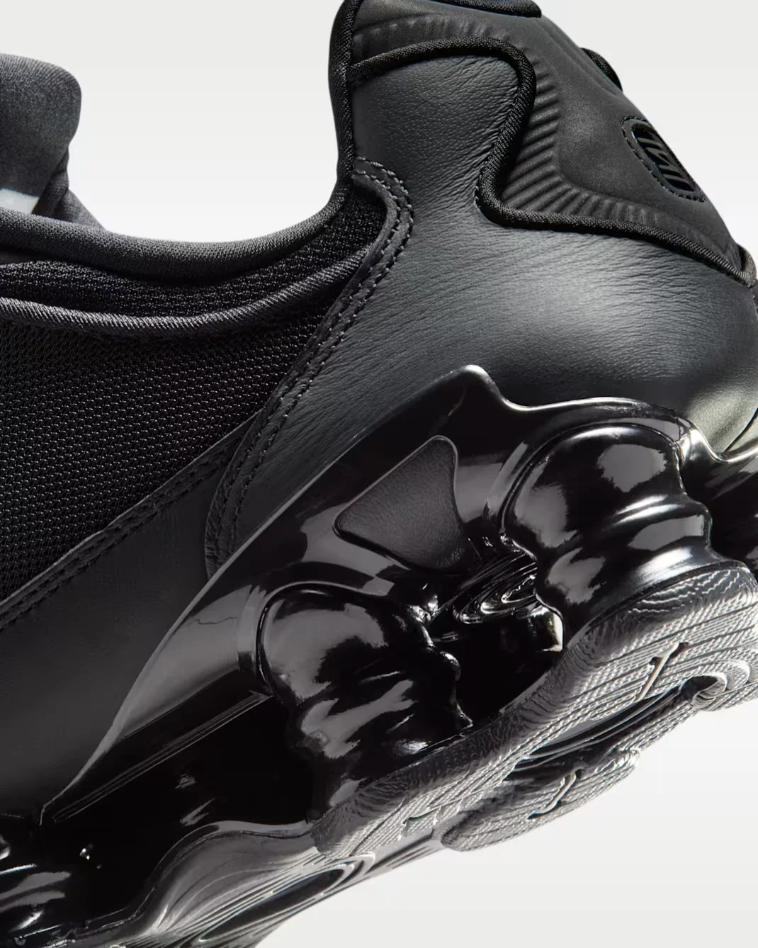 Nike Shox TL Black Cave Stone HM9612-010 Nike Shox TL Women's Shoes Black Cave Stone Nike Shox TL Black Side View Nike Shox TL Front View Nike Shox TL Rear View Nike Shox TL Full Length Shox Cushioning Nike Shox TL TPU Cage Upper Nike Shox TL Rubber Outsole Nike Shox TL Lifestyle Sneakers Original Nike Shox TL Pakistan
